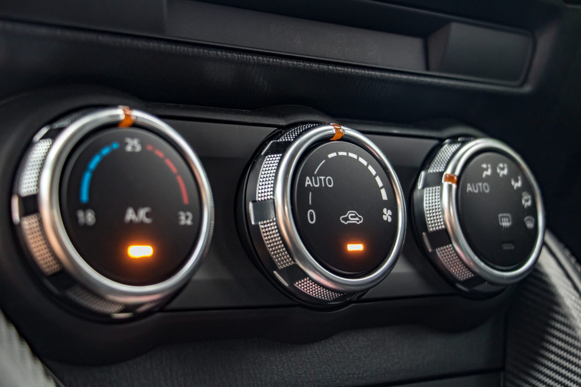 Air conditioning controls on the car dashboard. Close up car ventilation system, details of controls of modern car.